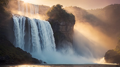 Waterfall Towering Cliffside